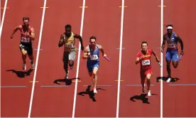  ?? Photograph: Ryan Pierse/Getty Images ?? The US men’s 4x100 relay team crashed to a sixth-place finish that left them out of the final and extended a quarter-century of misery for the country that brings the deepest track team to the Olympics.