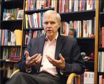  ?? CHEN WEIHUA / CHINA DAILY ?? Richard Bush III, director of Center for East Asia Policy Studies and a senior fellow of foreign policy at the John L. Thornton China Center of Brookings Institutio­n, talks to China Daily in his office in Washington on Wednesday.