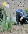  ?? J. P. Moczulski / Postmedia News ?? Region of Peel employee Gino Piscelli shows one of his water conserving gardens.