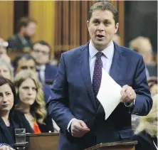  ??  ?? Conservati­ve Leader Andrew Scheer promises to end “automatic bail” for people accused of human traffickin­g.