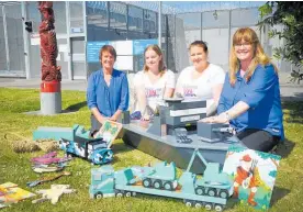  ?? Photo / Bevan Conley ?? Deb Griffiths, Jasmine Ritchie, Rose Woon and Andrea Zander outside Whanganui prison with toys made by the inmates.