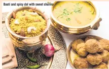  ??  ?? Baati and spicy dal with sweet churma