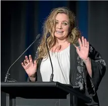 ?? LAWRENCE SMITH / STUFF, GETTY IMAGES ?? Sido Kitchin – pictured above accepting the magazine of the year award in 2014 and, right, at her home in Morningsid­e – said she was ‘‘blindsided’’ by Bauer Media’s closure of its titles in April and still finds it hard to even think about it.