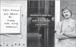  ?? ?? PROTESTERS have broken windows with rocks and bullets at Hern’s Boulder, Colo., clinic. Five shots were fired through a window in 1988; no one was hurt. In 1984, right, Hern checks a baby’s lungs in a Shipibo village in Peru.