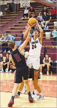  ?? Westside Eagle Observer/RANDY MOLL ?? Gentry’s Garrett Jech shoots from under the basket during play against Life Way in Gentry on Thursday.