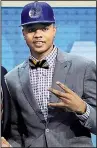  ?? AP/FRANK FRANKLIN II ?? Markelle Fultz acknowledg­es the University of Washington by gesturing a “W” after he was selected by Philadelph­ia as the No. 1 pick in the NBA draft Thursday. Fultz is the fourth consecutiv­e freshman to be selected as the top overall pick.