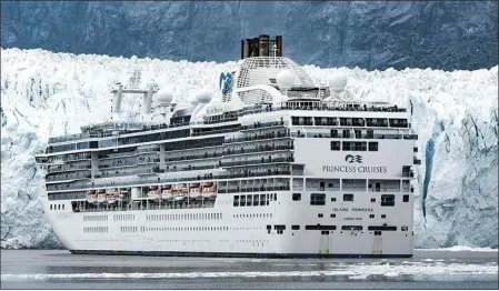  ?? TIM RUE / BLOOMBERG ?? The Princess Cruise Lines Island Princess cruise ship passes in front of Margerie Glacier in Glacier Bay, Alaska, on July 12, 2019.