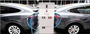  ?? (Courtesy pic) ?? Electric vehicles charging. EEC is taking a step to ready its institutio­nal capacity in the deployment of EV.