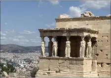  ?? COURTESY OF CATHRYN KNEZEVICH ?? The Erechtheio­n, opposite the Parthenon on the 7-acre Acropolis hilltop, is distinguis­hed by the Porch of the Caryatids, where six tall maidens serve as columns to support the roof.