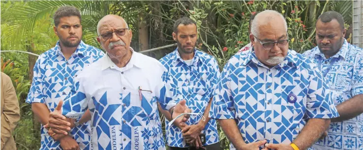  ?? Photo: Inoke Rabonu ?? SODELPA Caretaker party leader Sitiveni Rabuka (second from left) and newly elected party president Ratu Epenisa Cakobau (fourth from left), with SODELPA youth members at the Novotel Convention Centre on July 25, 2020.