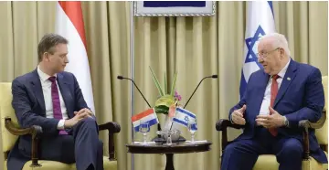  ?? (Mark Neyman/GPO) ?? PRESIDENT REUVEN RIVLIN meets with Dutch Foreign Minister Halbe Zijlstra at the President’s Residence in Jerusalem yesterday.