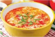  ??  ?? Tomato and egg drop soup