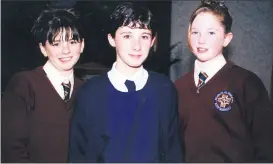  ?? ?? L-r: Áine Dalton (Ballybeg), Niamh Condon (Kilglass) and Yvonne Murphy (Lower Cork Street), who received their Confirmati­on in Mitchelsto­wn in 2001.