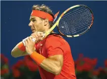  ?? AFP ?? RAFAEL NADAL OF SPAIN plays a shot against Karen Khachanov of Russia during a semi final match on Day 6 of the Rogers Cup at Aviva Center on Aug. 11 in Toronto, Canada. ß