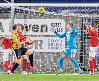  ??  ?? Jack Hamilton scores East Fife’s second and the winner in the victory over Falkirk