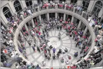  ?? RALPH BARRERA / AMERICAN-STATESMAN ?? Hundreds rally against the transgende­r bathroom bill Tuesday in the Capitol open-air rotunda. More than 430 people were signed up to testify about the bill.