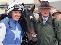  ??  ?? END OF AN ERA Willie Mullins (right) with Ruby Walsh after the jockey retired following his victory on Kemboy last May