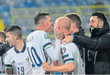  ??  ?? Northern Ireland players celebrate their semi win.