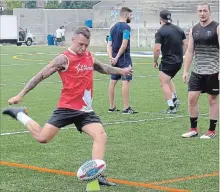  ?? NEIL DAVIDSON THE CANADIAN PRESS FILE PHOTO ?? The Toronto Wolfpack go after their first-ever win over a Super League side when they host the Widnes Vikings on Saturday. Fullback Gareth O'Brien takes a kick at goal during a Wolfpack practice earlier this year.