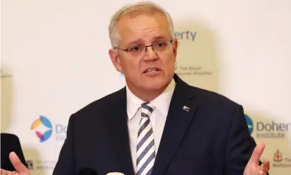  ?? Photograph: Con Chronis/EPA ?? Prime minister Scott Morrison has announced a deal between the federal and Victorian government­s and Moderna for a vaccine manufactur­ing facility in Melbourne.