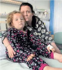  ??  ?? Phoebe, six, with mother Sarah in hospital yesterday