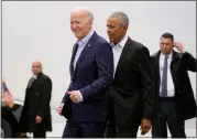  ?? ALEX BRANDON — THE ASSOCIATED PRESS ?? President Joe Biden, left, and former President Barack Obama arrive at John F. Kennedy Internatio­nal Airport on Thursday.