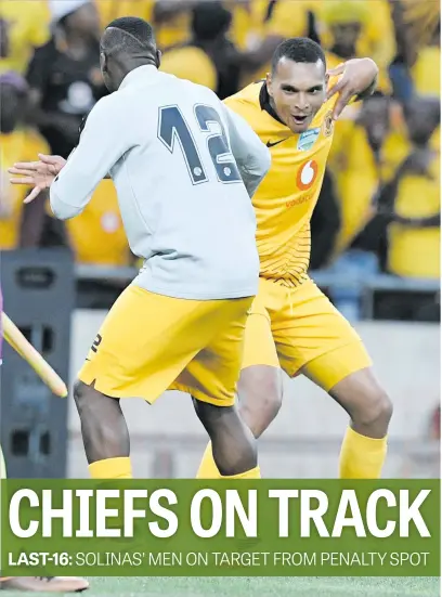  ?? Picture: Gallo Images ?? SAVIOUR. Ryan Moon celebrates with George Maluleka after scoring the winning penalty against Black Leopards in the last-16 of the Talkom knockout at FNB Stadium yesterday.