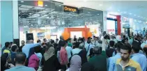  ??  ?? A large gathering of people during the opening of Orange Egypt new smart store at Mall of Arabia