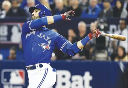  ?? CP PHOTO ?? Jose Bautista rose from obscurity to fame with the Blue Jays and helped return baseball to prominence in Canada.