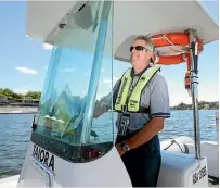  ?? PHOTO: DONNA WALSH/STUFF ?? Lake Karapiro harbourmas­ter Richard Barnett out on the lake in his boat, Taiora.