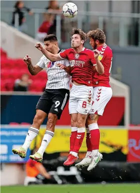  ?? ?? City’s Joe Williams, centre, and Nathan Baker battle with Aleksandar Mitrovic