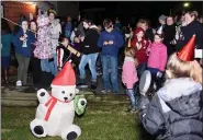  ??  ?? Another safe Bear Drop landing on New Year’s Eve as the crowd watches in Boyertown.