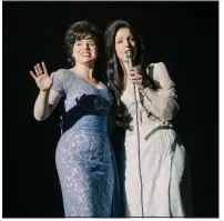  ?? Lifetime/AP ?? Megan Hilty is Patsy Cline (left) and Jessie Mueller is Loretta Lynn in a scene from the film Patsy & Loretta.