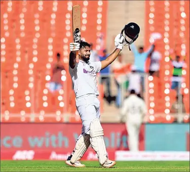  ??  ?? India's Rishabh Pant celebrates after scoring a century on the second day of the fourth Test against England in Ahmedabad.