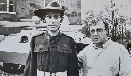  ??  ?? Ray Kelliher pictured with the uniform of his uncle Richard Kelliher who was awarded the Victoria Cross for bravery during World War II. The uniform is being displayed at the WWII exhibition in the Kerry County Museum.