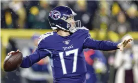  ?? ASSOCIATED PRESS ?? Titans quarterbac­k Ryan Tannehill threw for 333 yards and two touchdowns to outduel Aaron Rodgers in Thursday’s 27-17 win against the Packers. The AFC South-leading Titans, now 7-3, have won seven of their last eight games.