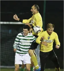  ??  ?? Seaview’s Michael Wolohan out jumps Knocklyon’s Dylan Clarke.