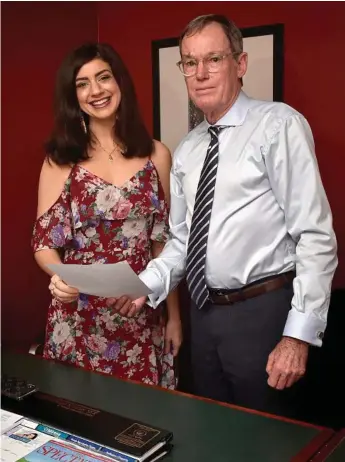  ?? Photo: Bev Lacey ?? FIRST SURGERY: Katanya Watherston, with Dr John Esler, was recently diagnosed with bowel cancer and will undergo a Toowoomba-first procedure to preserve her fertility.