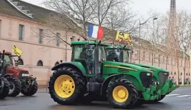  ?? THOMAS PADILLA/AP ?? Farmers were back in Paris on their tractors Friday in a new protest demanding more government support and simpler regulation­s.