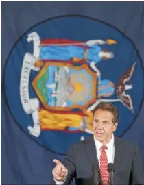  ?? MARY ALTAFFER — ASSOCIATED PRESS ?? New York Gov. Andrew Cuomo speaks at a rally, June 6, in New York. Cuomo and House Minority Leader Nancy Pelosi, D-Calif., are hoping to increase the number of congressio­nal seats held by the Democratic Party.