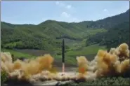  ?? KOREAN CENTRAL NEWS AGENCY — KOREA NEWS SERVICE VIA AP, FILE ?? This photo on distribute­d by the North Korean government shows what was said to be the launch of a Hwasong-14 interconti­nental ballistic missile, ICBM, in North Korea’s northwest.