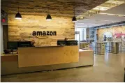  ?? DEBORAH CANNON / AMERICAN-STATESMAN 2016 ?? The lobby of Amazon’s offices near the Domain. Austin is one of 20 finalists for the e-commerce giant’s second headquarte­rs.