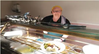  ??  ?? Bríd Hallahan serves up the last carvery at the Abbey on Friday