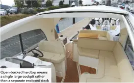  ??  ?? Open-backed hardtop means a single large cockpit rather than a separate enclosed deck
