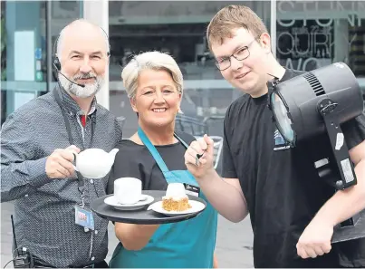  ?? Picture: Phil Hannah. ?? Colin Bailie, duty front of house manager, catering assistant Allison Gormley and head of lighting Keir Mcfarlane.