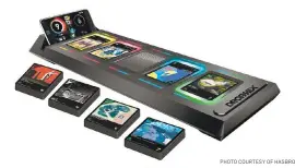  ?? PHOTO COURTESY OF HASBRO ?? “DropMix” mixes trading cards along with a high-tech peripheral and an Android or iOS app to create a music experience, often by changing mixes.