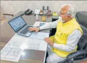  ?? PTI ?? ■
Haryana chief minister Manohar Lal Khattar launches the ‘Jal Jeevan Mission’ dashboard, during the nationwide lockdown, in Chandigarh, on Friday.