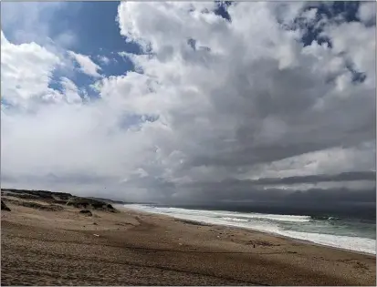  ?? TESS KENNY — MONTEREY HERALD ?? Clouds lingered off the Monterey Peninsula Monday morning as an uncharacte­ristically strong storm for September cycled through the Central Coast.