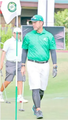  ?? PHOTOGRAPH BY JOEY SANCHEZ MENDOZA FOR THE DAILY TRIBUNE @tribunephl_joey ?? BRIAN Cabral, DAILY TRIBUNE columnist and Alabang Country Club golf committee president, studies his line of putt at the 10th green Wednesday on Day 3 of Mango Tee.