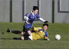  ??  ?? Avondale’s Aidan Murray puts a stop to Cillian Gilligan’s run.